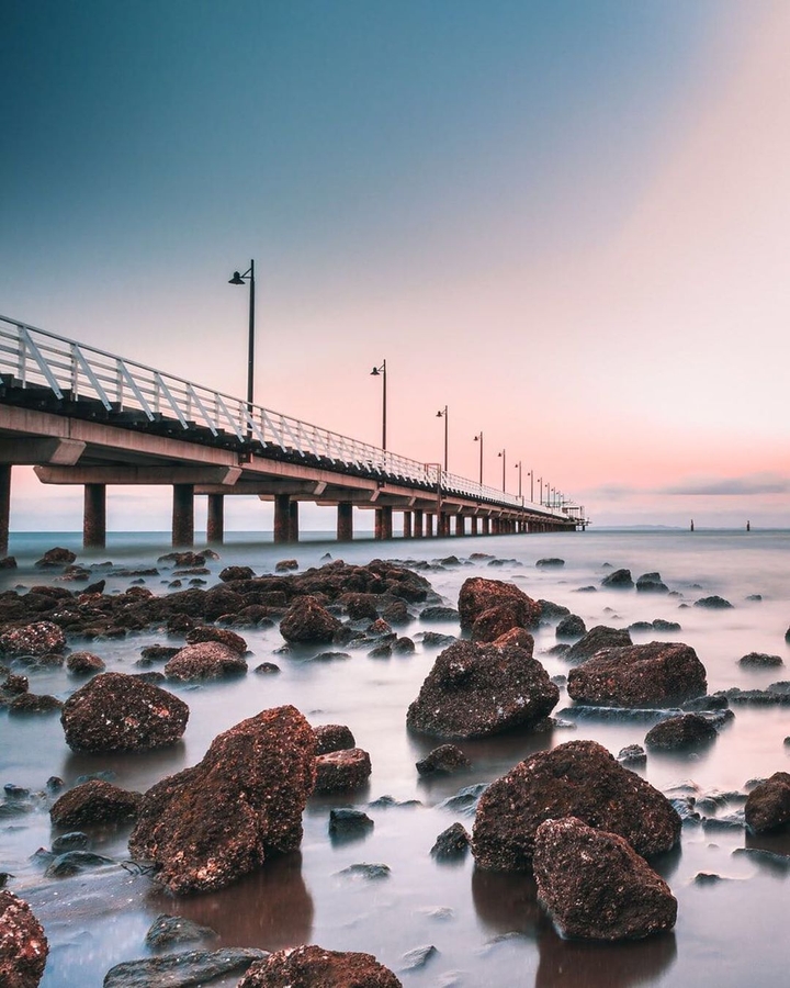 "Beautiful sunset tones at the pier"