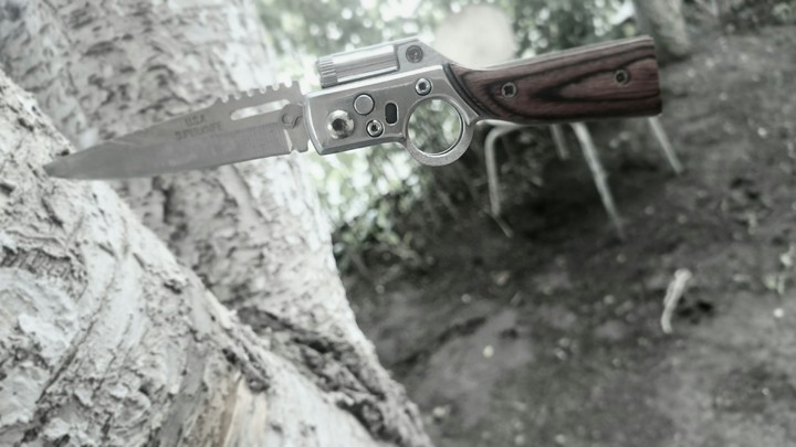 нож