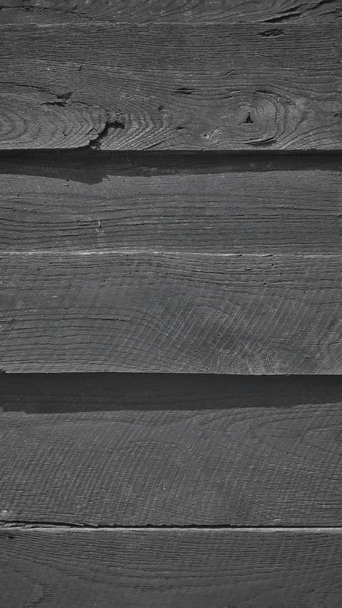 Just wood... Dark wood.