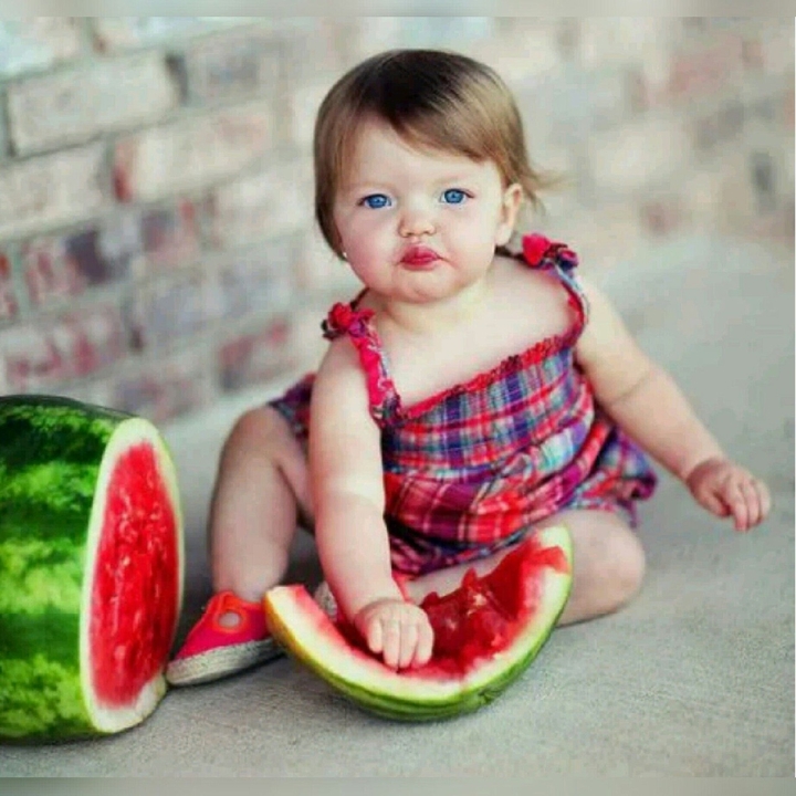cute baby eat watermelon