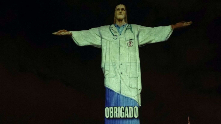Christ the Redeemer, dressed as a health professional