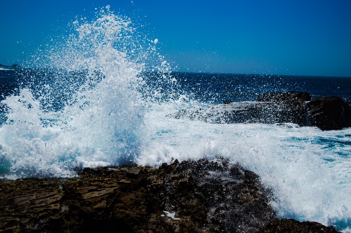 against the rocks
