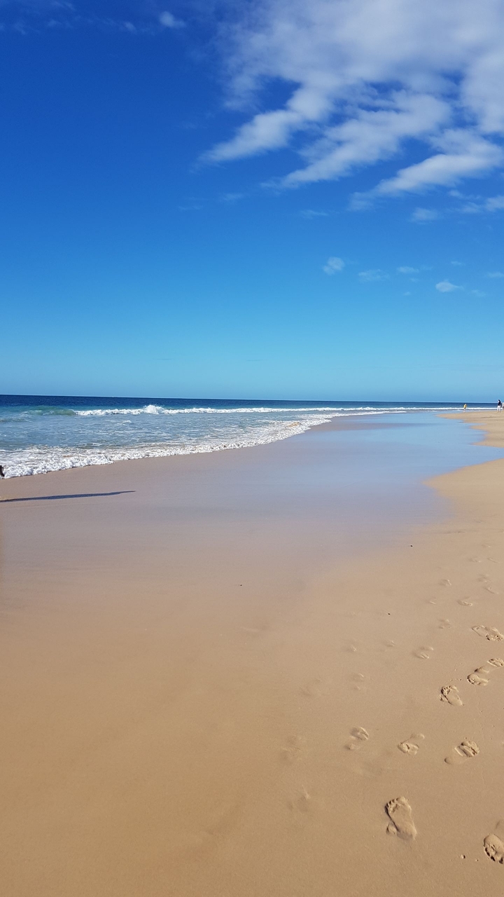 Footsteps On The Beach