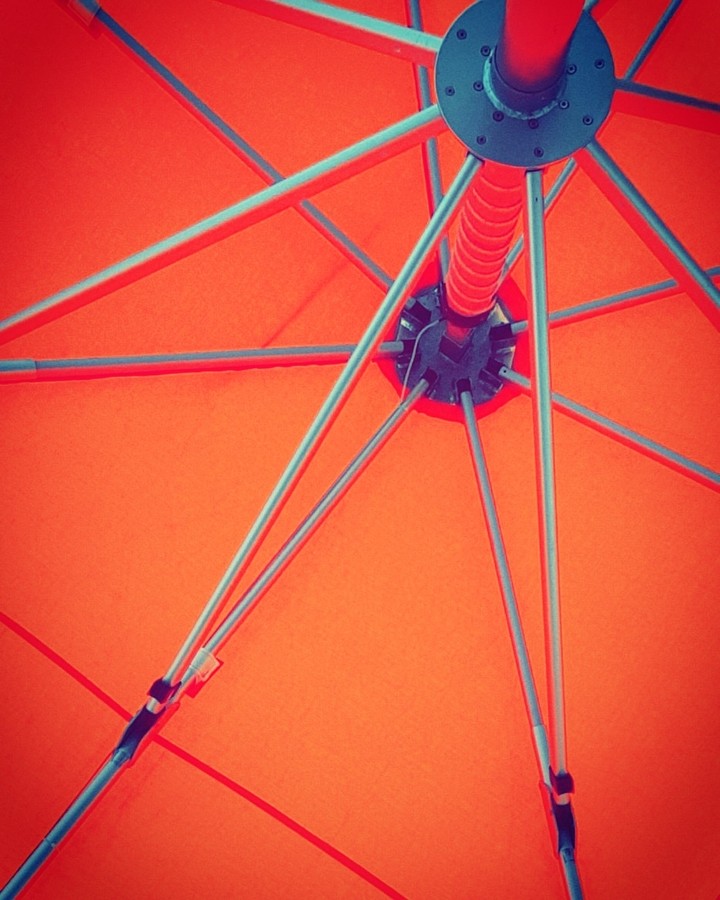 underneath the umbrella