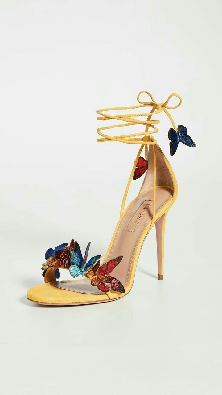 Yellow butterfly stilettoes