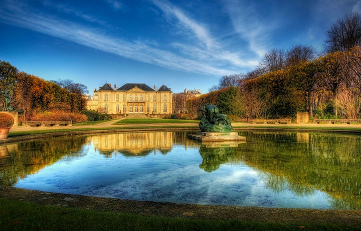 A good house with a lake and trees
