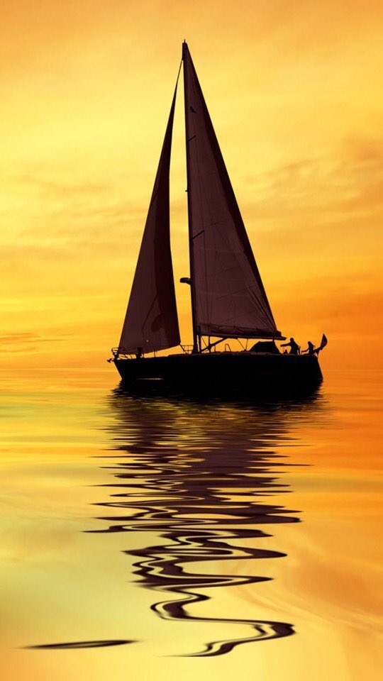 Sailing Boat And Reflection.
