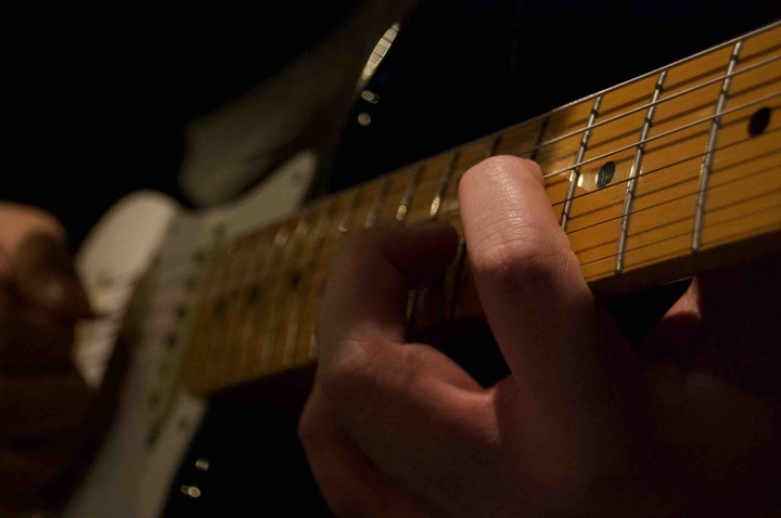 My friend playing the guitar