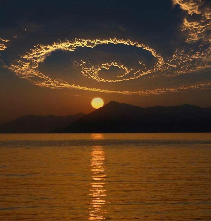 A spiral cloud  sunset.
