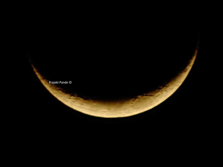 Golden curved moon