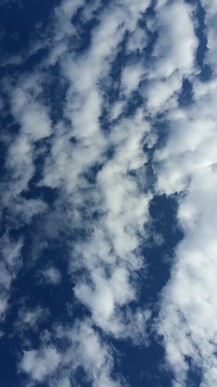 He films the clouds