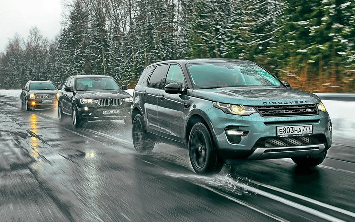 land rover and bmw and cadillac