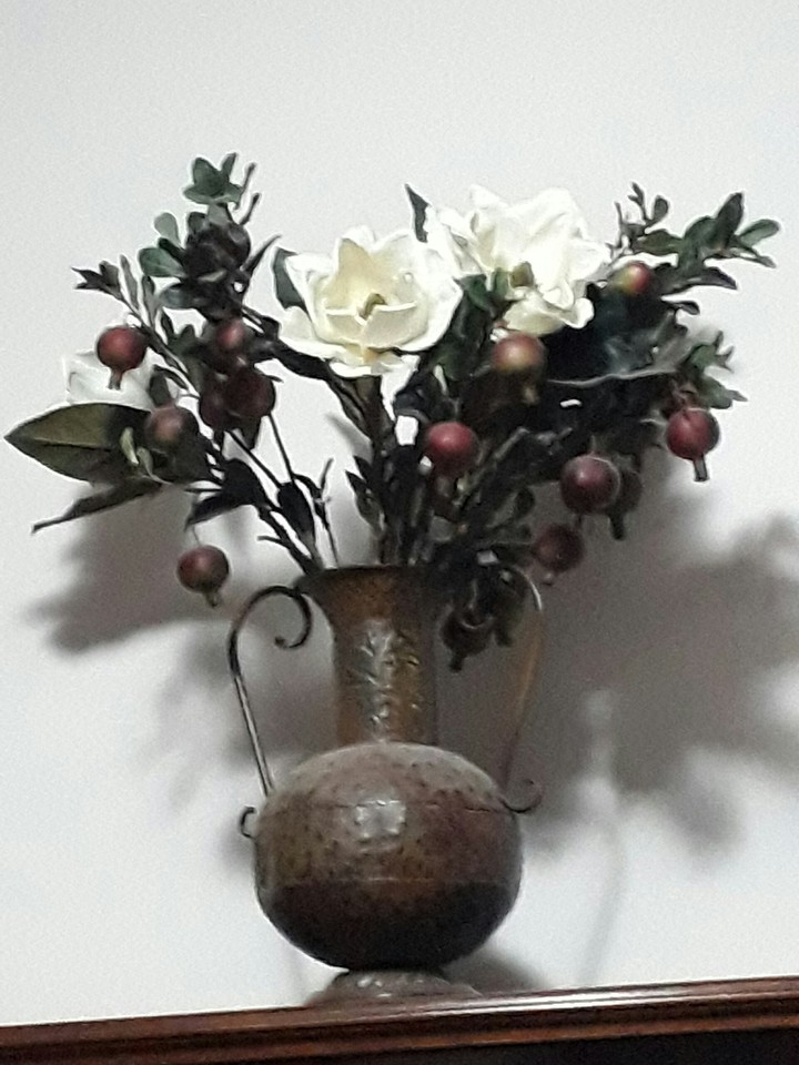 Vase with flowers and fruit...