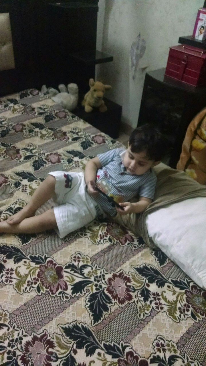 Baby girl with mobile