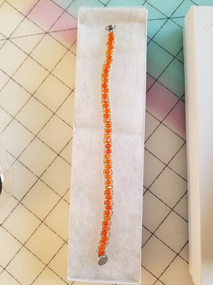 orange Swarovski crystals tennis type bracelet