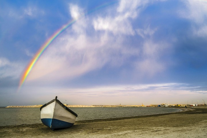 Boat and rainbow
