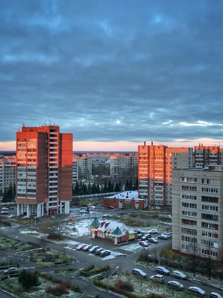 город
