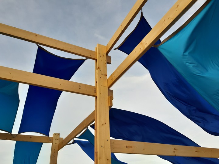 blue fabric and brown wood
