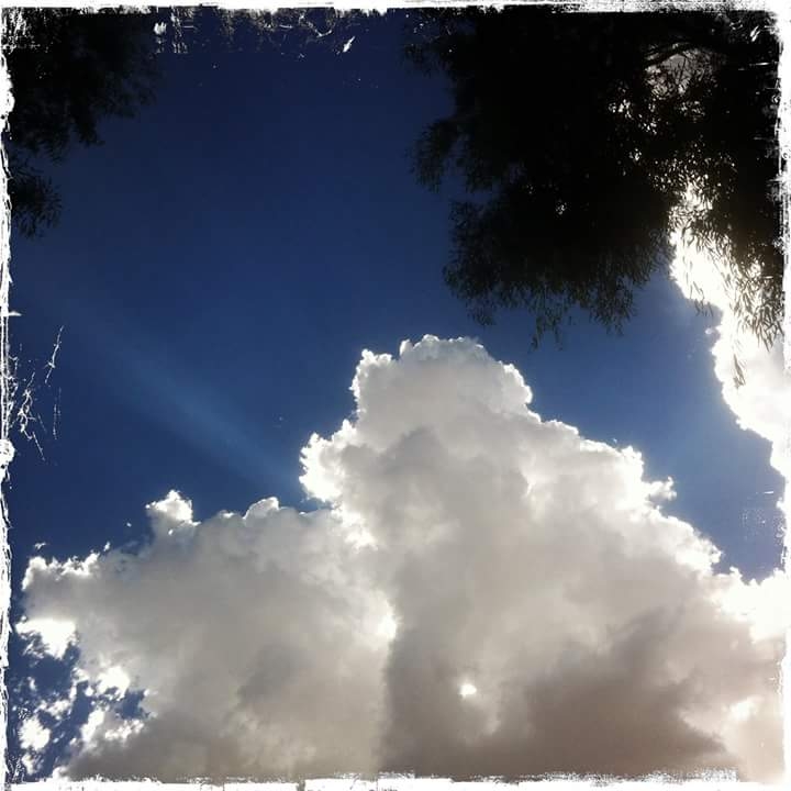 Sun behind clouds