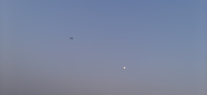 Plane Moon in Blue Sky
