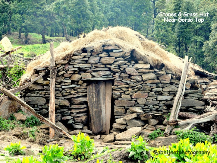 Grass And Stone Hut