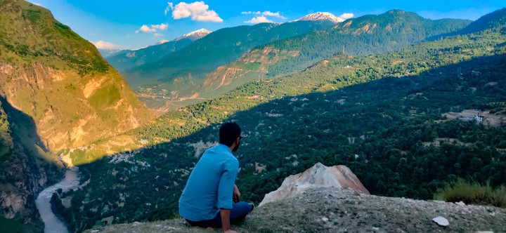 in the lap of the Himalayas