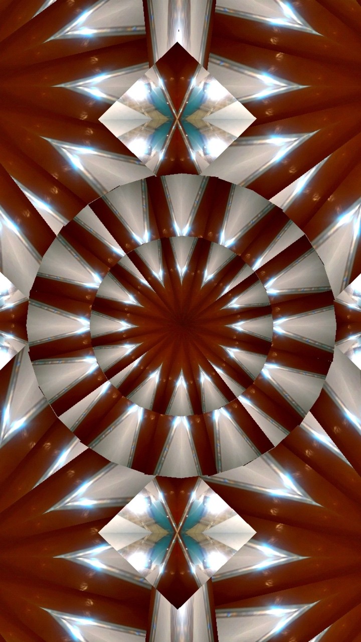 Star pattern metal and glass kaleidoscope