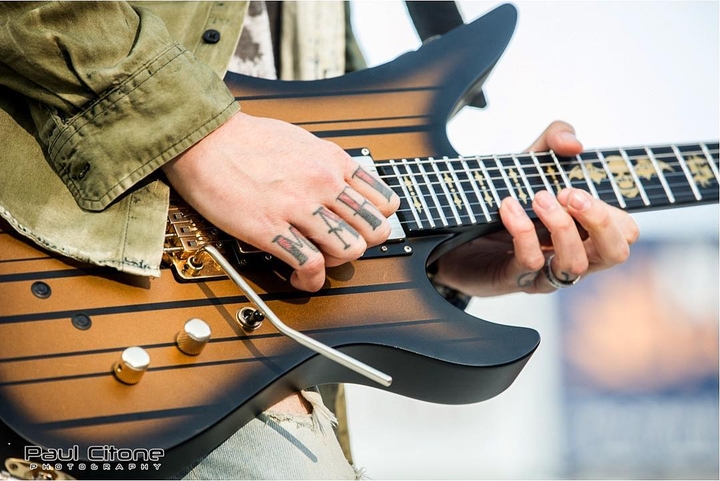 Synatster gates.. D coolest guitarist