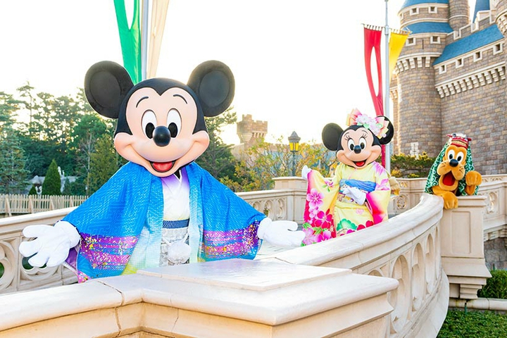 Mickey, Minnie, Goofy at Disney castle