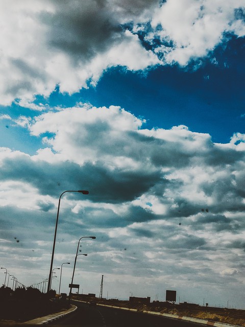 road sky clouds