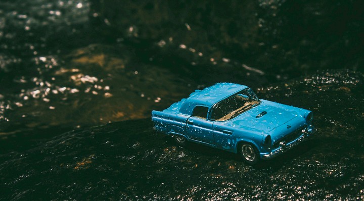 Old car under rain