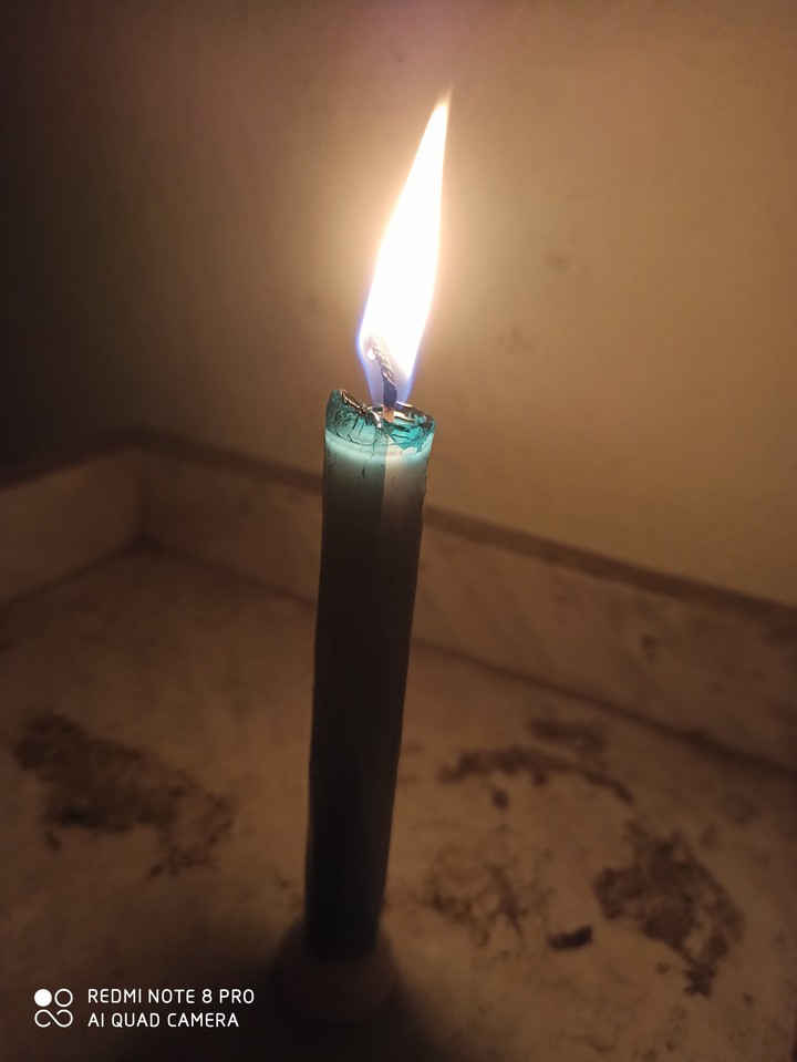 candle with blue plastic