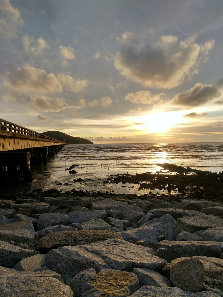 Sunset by seaside.