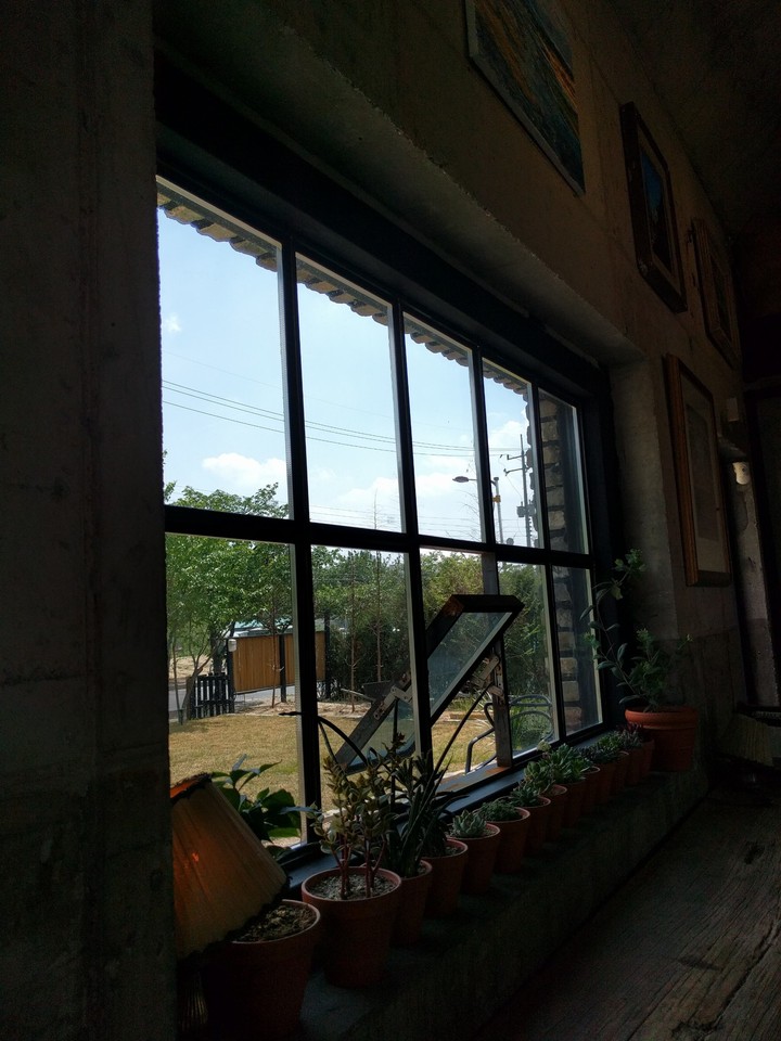 Blue sky outside cafe window