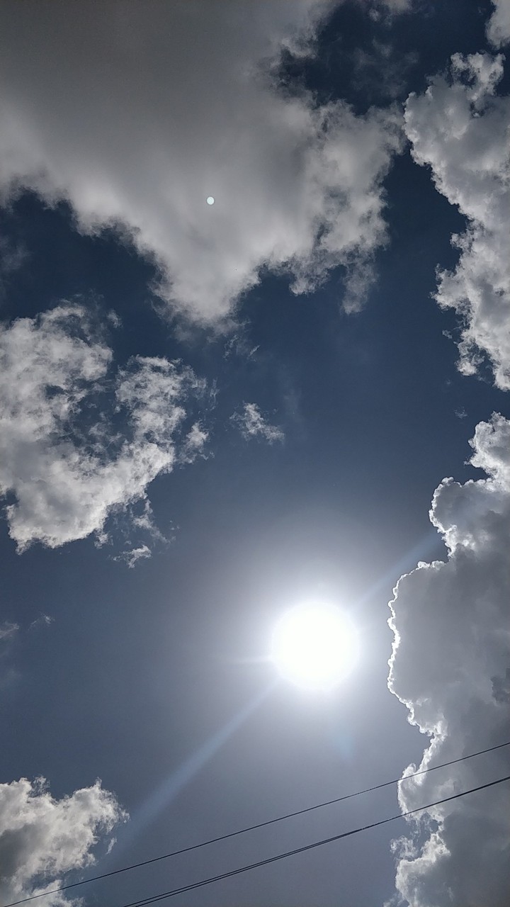 blue skies and the clouds