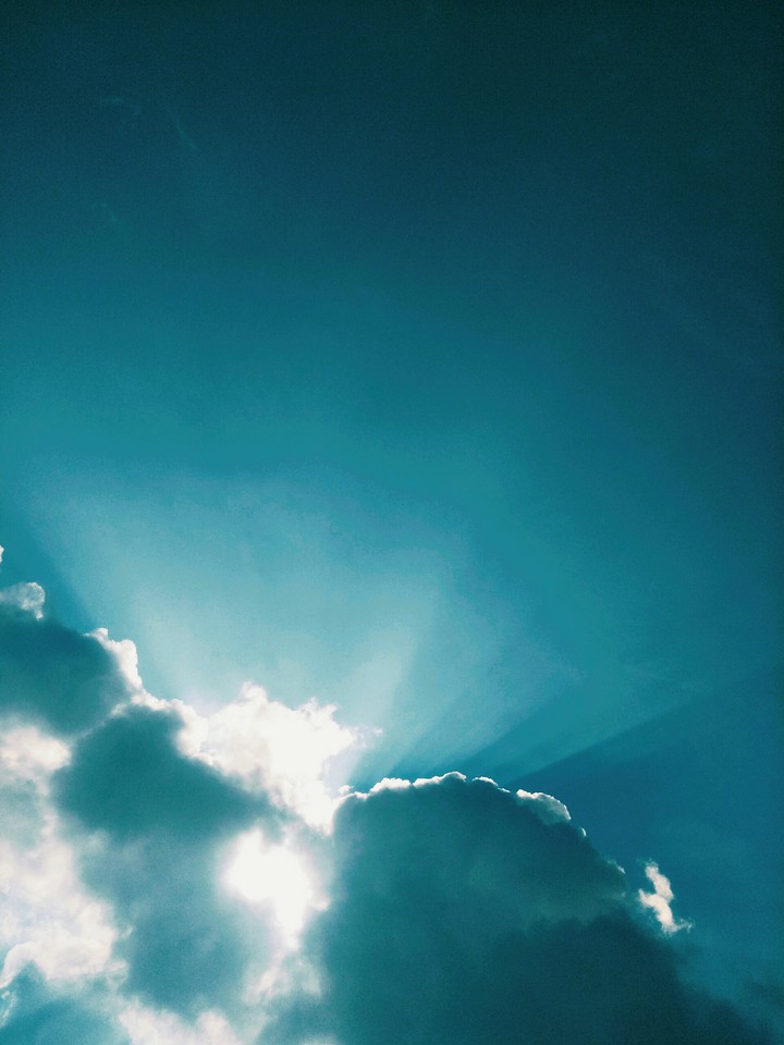 Sun between clouds