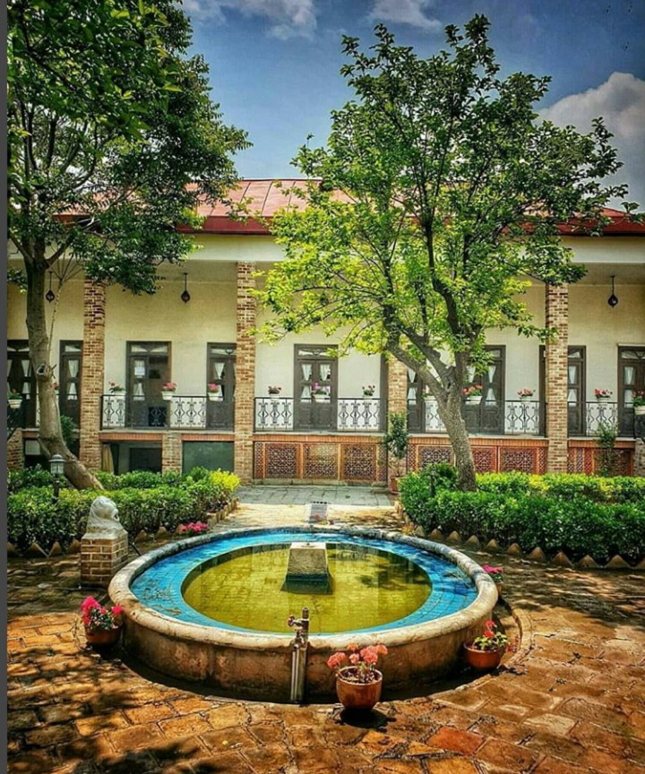 A beautiful green  traditional house?