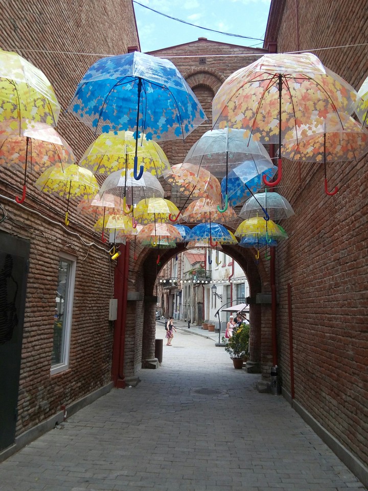 a street with brollies