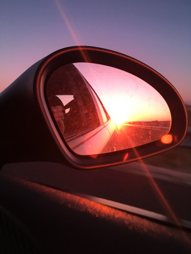 In the car.