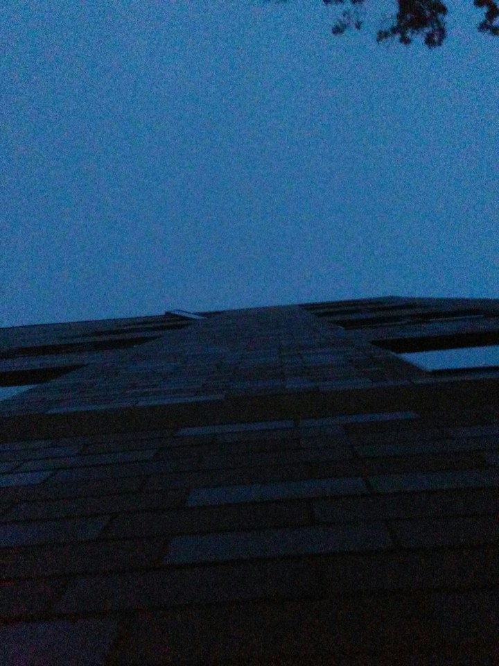 a dark window. a dark building