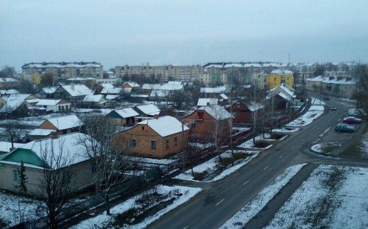 город