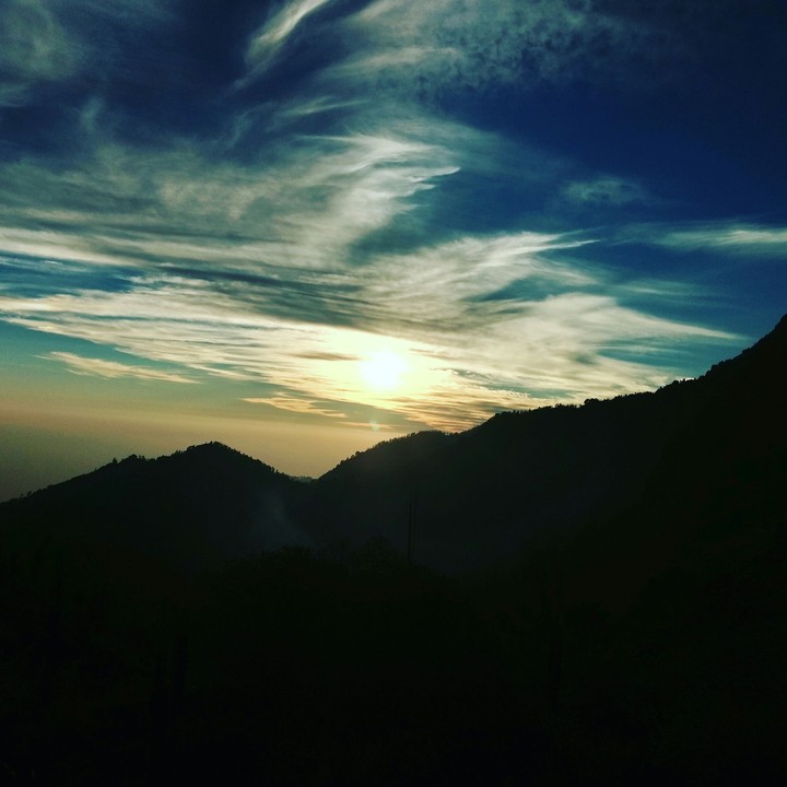 sunset at the edge of mountain