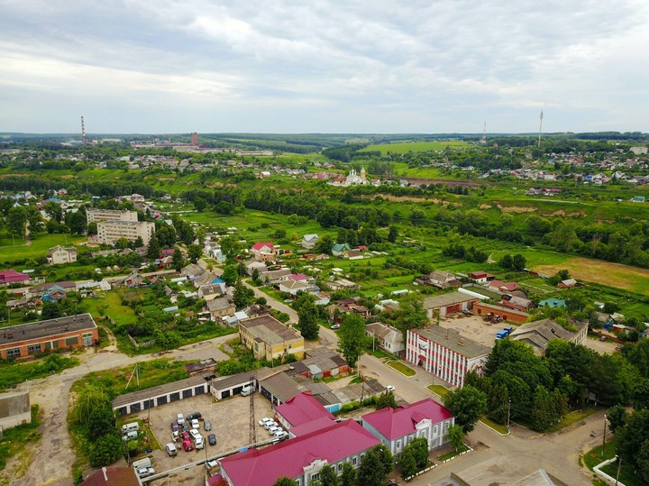 город