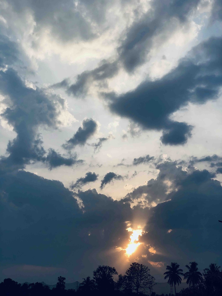 explosion of sun through clouds