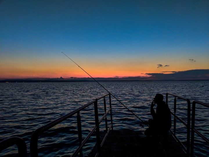 fishing at sunset