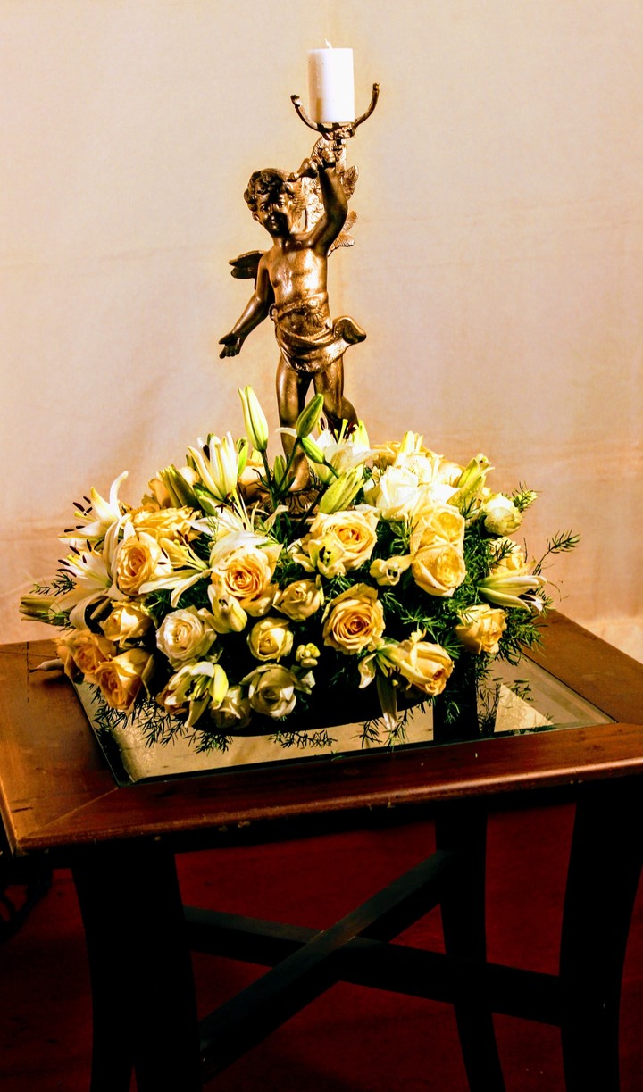Candle stand and flowers