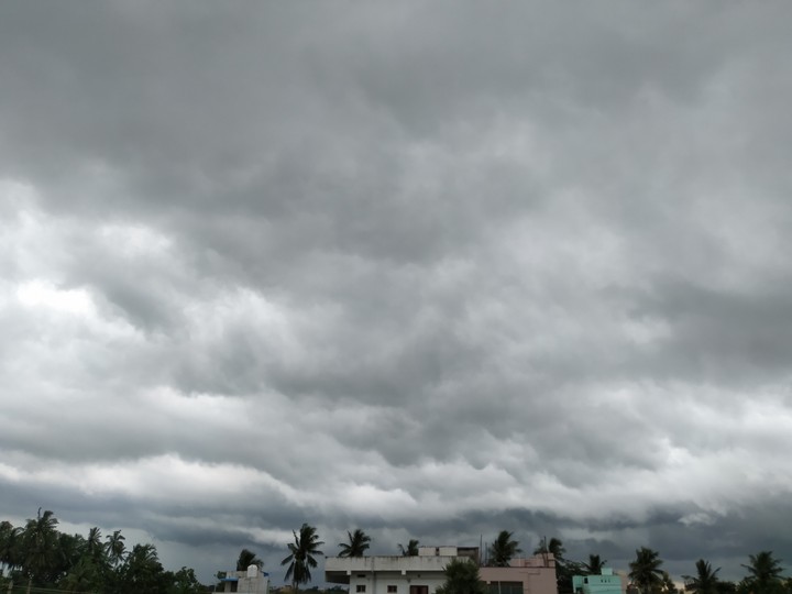 full of dark clouds