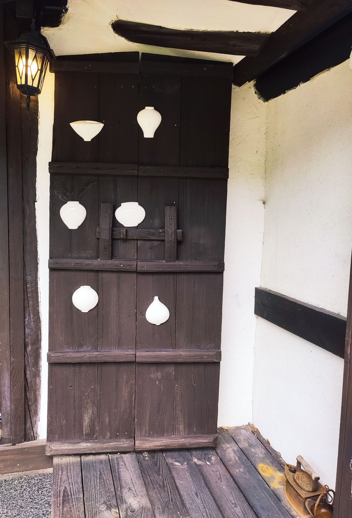 wooden door with ceramics