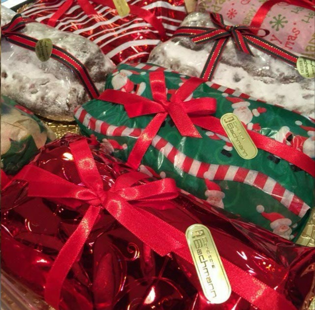 festively-wrapped Christmas fruitcake and stollen