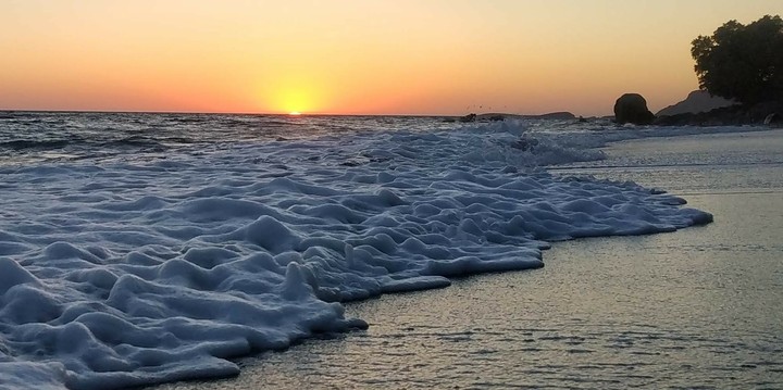 sunset with wavy sea